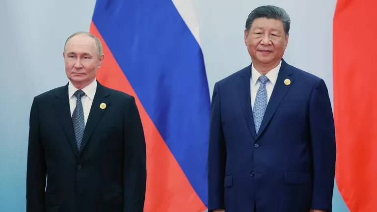 Ушаков: в ходе визита Путина в КНР подпишут документы по связям в промышленности